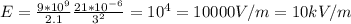 E= \frac{9*10 ^{9} }{2.1} \frac{21*10 ^{-6} }{3 ^{2} } =10 ^{4} =10000V/m=10kV/m