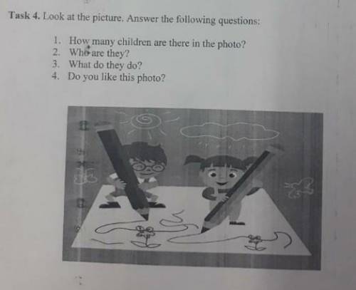 How many children are there in the photo ответь на вопросы ?напиши ответ письменнопосмотри фото​
